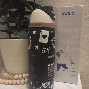 Good Luck Owala water bottle in black and white
